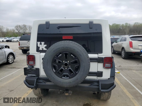2013 Jeep Wrangler Unlimited Moab with VIN 1C4BJWEG6DL583841, listed as a Copart auction lot 52487915 with 130,369 mi miles and Salvage title. Bid and sale history available at DreamBid. Image 6.