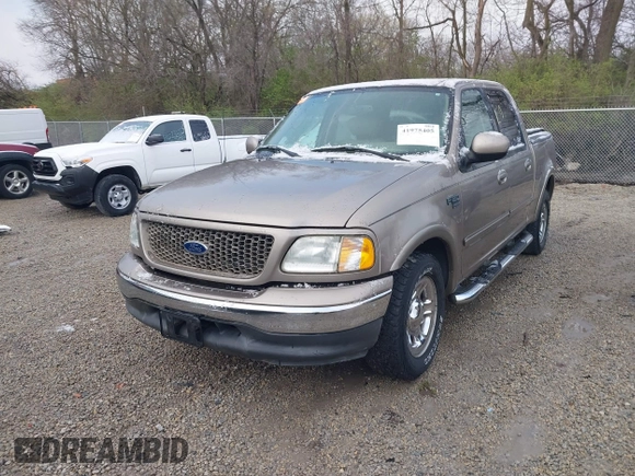 2003 Ford F-150 XLT with VIN 1FTRW07673KD34518, listed as a IAAI auction lot 41975405 with 95,775 mi miles. Bid and sale history available at carsss.com. Image 2.