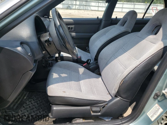 1994 Toyota Tercel DX z VIN JT2EL43T3R0489039, wystawiony jako Copart lot #67834034 z przebiegiem 139 726 mil mil oraz Szkoda całkowita • Salvage title. Historia ofert i sprzedaży dostępna na DreamBid. Obrazek 7.