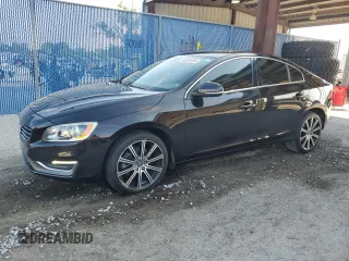 2015 Volvo S60 T5 Drive-E Premier z VIN YV140MFK0F2354299, wystawiony jako Copart lot #53264405 z przebiegiem 72 867 mil mil oraz Szkoda całkowita • Salvage title. Historia ofert i sprzedaży dostępna na DreamBid. Obrazek 1.