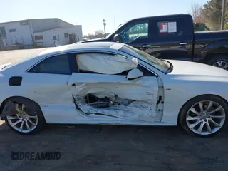 2016 Audi A5 Premium Plus with VIN WAUM2AFR2GA056868, listed as a IAAI auction lot 41764198 with 106,751 mi miles. Bid and sale history available at carsss.com. Image 13.