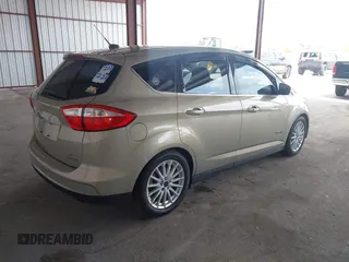 2016 Ford C-Max SEL z VIN 1FADP5BUXGL106531, wystawiony jako IAAI lot #42341433 z przebiegiem 74 854 mil mil oraz . Historia ofert i sprzedaży dostępna na DreamBid. Obrazek 4.