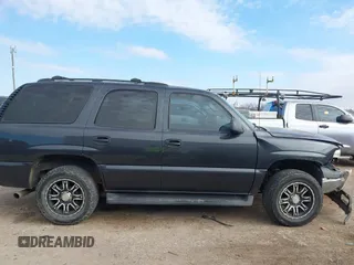 2006 Chevrolet Tahoe LS with VIN 1GNEC13V16J163907, listed as a IAAI auction lot 41232903 with 142,382 mi miles. Bid and sale history available at carsss.com. Image 13.