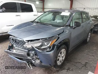 2022 Toyota Corolla Cross L with VIN 7MUAAAAG9NV034659, listed as a IAAI auction lot 42125356 with 14,631 mi miles and . Bid and sale history available at DreamBid. Image 17.