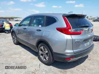 2019 Honda CR-V LX with VIN 2HKRW5H31KH411771, listed as a IAAI auction lot 42060193 with 175,036 mi miles and . Bid and sale history available at DreamBid. Image 3.