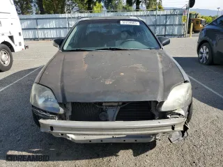 2000 Honda Civic VP with VIN 2HGEJ6612YH577711, listed as a Copart auction lot 52239805 with 195,138 mi miles and Salvage Title. Bid and sale history available at carsss.com. Image 5.