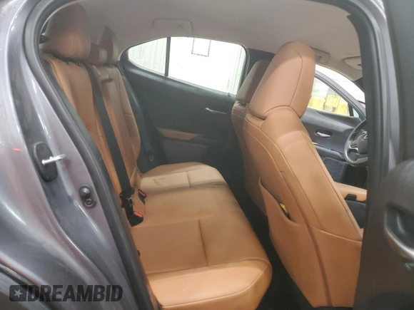 2021 Lexus UX 250h z VIN JTHX9JBH8M2047296, wystawiony jako Copart lot #87916535 z przebiegiem 10 297 mil mil oraz Szkoda całkowita • Salvage title. Historia ofert i sprzedaży dostępna na DreamBid. Obrazek 11.