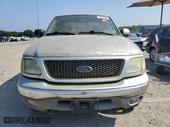 2003 Ford F-150 z VIN 2FTRX08W83CB03269, wystawiony jako Copart lot #63915625 z przebiegiem 150 127 mil mil oraz Czysty tytuł • Clean title. Historia ofert i sprzedaży dostępna na DreamBid. Obrazek 5.
