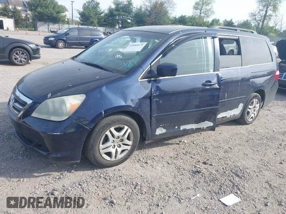 2005 Honda Odyssey EX with VIN 5FNRL38455B135555, listed as a IAAI auction lot 42080079 with 149,468 mi miles and . Bid and sale history available at carsss.com. Image 2.