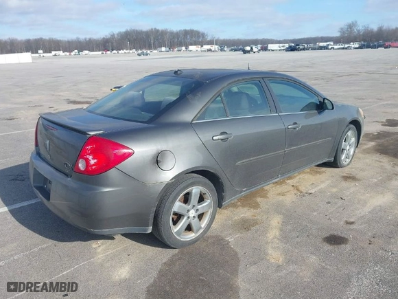 2005 Pontiac G6 GT with VIN 1G2ZH528954147048, listed as a IAAI auction lot 41202223 with 206,106 mi miles. Bid and sale history available at carsss.com. Image 4.