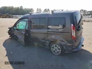 2021 Ford Transit Connect XLT with VIN NM0GS9F27M1504144, listed as a Copart auction lot 70214034 with 45,827 mi miles and Salvage title. Bid and sale history available at DreamBid. Image 2.