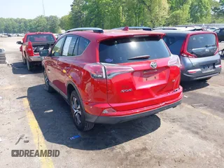 2016 Toyota RAV4 LE with VIN JTMZFREV1GJ098247, listed as a IAAI auction lot 42065800 with 199,172 mi miles and . Bid and sale history available at DreamBid. Image 3.