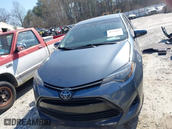 2019 Toyota Corolla L with VIN 2T1BURHE4KC134729, listed as a IAAI auction lot 41779629 with 240,685 mi miles. Bid and sale history available at carsss.com. Image 12.