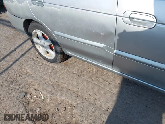 2002 Nissan Sentra GXE z VIN 3N1CB51DX2L663011, wystawiony jako IAAI lot #42533399 z przebiegiem 176 956 mil mil oraz . Historia ofert i sprzedaży dostępna na DreamBid. Obrazek 6.
