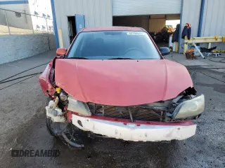 2005 Mazda 3 i with VIN JM1BK12F251245507, listed as a Copart auction lot 42788015 with 263,284 mi miles and Salvage Title. Bid and sale history available at DreamBid. Image 5.