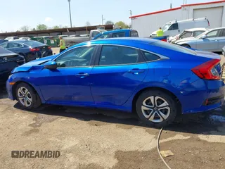 2018 Honda Civic LX with VIN 19XFC2F53JE020297, listed as a IAAI auction lot 42114807 with 124,058 mi miles and . Bid and sale history available at carsss.com. Image 14.
