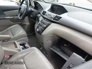 2012 Honda Odyssey Touring с VIN 5FNRL5H90CB083157, выставлен на аукционе IAAI как лот 42176609 с пробегом 250 000 миль миль и . История ставок и продаж доступна на DreamBid. Изображение 5.