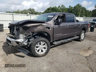 2017 Nissan Titan XD SL with VIN 1N6BA1F44HN510174, listed as a Copart auction lot 63245694 with 121,868 mi miles and Salvage Title. Bid and sale history available at carsss.com. Image 1.