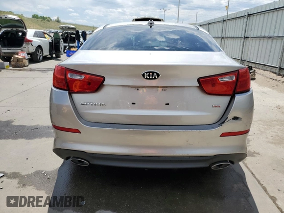 2014 Kia Optima LX z VIN KNAGM4A79E5470153, wystawiony jako Copart lot #58316245 z przebiegiem 85 904 mil mil oraz Czysty tytuł • Clean title. Historia ofert i sprzedaży dostępna na DreamBid. Obrazek 6.