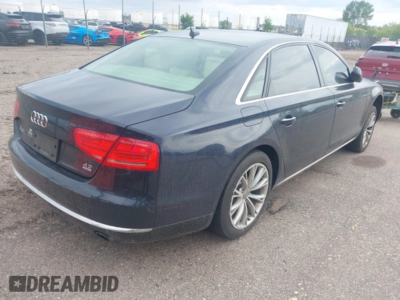 2011 Audi A8 z VIN WAURVAFD3BN019461, wystawiony jako IAAI lot #42211319 z przebiegiem 151 936 mil mil oraz . Historia ofert i sprzedaży dostępna na DreamBid. Obrazek 4.