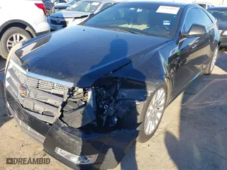 2011 Cadillac CTS Coupe Performance with VIN 1G6DK1ED9B0130927, listed as a IAAI auction lot 41414803 with 147,299 mi miles. Bid and sale history available at carsss.com. Image 17.