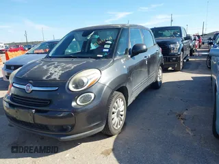2014 FIAT 500L Easy with VIN ZFBCFABH6EZ028069, listed as a IAAI auction lot 41303148 with 131,757 mi miles and . Bid and sale history available at DreamBid. Image 2.