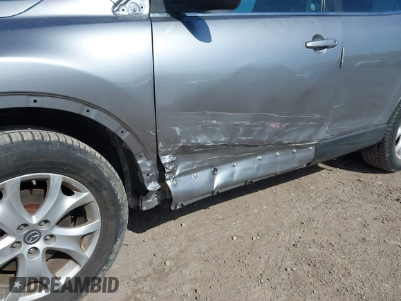 2015 Mazda CX-9 Sport with VIN JM3TB2BA6F0455539, listed as a IAAI auction lot 41839466 with 143,667 mi miles and . Bid and sale history available at carsss.com. Image 6.