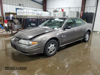 2002 Oldsmobile Alero GL1 z VIN 1G3NL52F22C252412, wystawiony jako Copart lot #87992185 z przebiegiem 122 551 mil mil oraz Szkody całkowita. Historia ofert i sprzedaży dostępna na DreamBid. Obrazek 1.