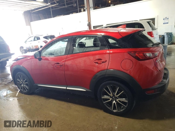 2017 Mazda CX-3 Grand Touring z VIN JM1DKFD70H0148182, wystawiony jako Copart lot #59032435 z przebiegiem 70 166 mil mil oraz Szkoda całkowita • Salvage title. Historia ofert i sprzedaży dostępna na DreamBid. Obrazek 2.