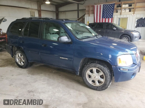 2005 GMC Envoy SLT with VIN 1GKDS13S352104934, listed as a Copart auction lot 86205864 with 166,638 mi miles and Clean Title. Bid and sale history available at carsss.com. Image 4.
