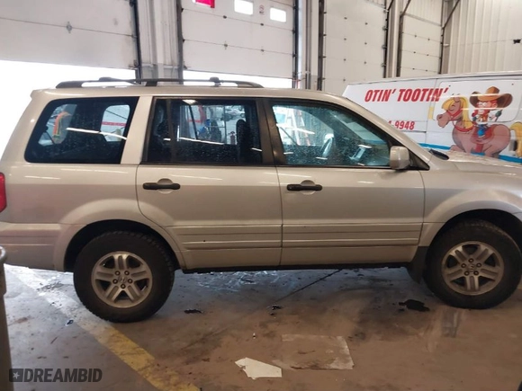 2005 Honda Pilot EX with VIN 2HKYF18405H521468, listed as a IAAI auction lot 41610497 with 244,806 mi miles. Bid and sale history available at carsss.com. Image 13.