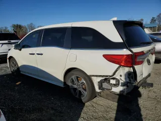 2018 Honda Odyssey Touring с VIN 5FNRL6H8XJB002031, выставлен на аукционе Copart как лот 49996105 с пробегом 202 284 миль миль и Чистый • Clean title. История ставок и продаж доступна на DreamBid. Изображение 2.