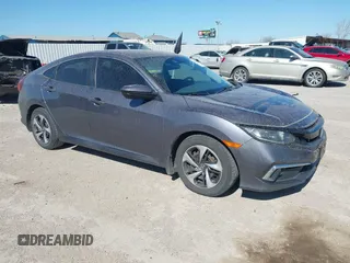 2019 Honda Civic Sedan LX with VIN 19XFC2F64KE005270, listed as a IAAI auction lot 41852238 with 106,604 mi miles. Bid and sale history available at carsss.com. Image 1.