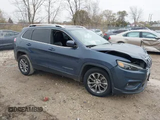 2019 Jeep Cherokee Latitude Plus with VIN 1C4PJLLB0KD434960, listed as a IAAI auction lot 40851354 with 111,989 mi miles. Bid and sale history available at carsss.com. Image 1.