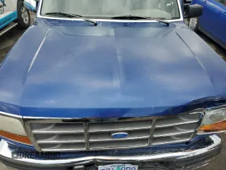 1996 Ford F-150 z VIN 1FTEX14H8TKA28287, wystawiony jako Copart lot #57454015 z przebiegiem 153 005 mil mil oraz Szkoda całkowita • Salvage title. Historia ofert i sprzedaży dostępna na DreamBid. Obrazek 11.