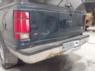 1994 Ford Explorer Eddie Bauer z VIN 1FMDU34X7RUD15166, wystawiony jako IAAI lot #42426543 z przebiegiem 168 233 mil mil oraz . Historia ofert i sprzedaży dostępna na DreamBid. Obrazek 6.