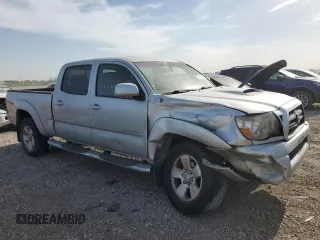 2005 Toyota Tacoma PreRunner with VIN 3TMKU72N65M003911, listed as a Copart auction lot 49546495 with 281,611 mi miles and Salvage title. Bid and sale history available at DreamBid. Image 4.