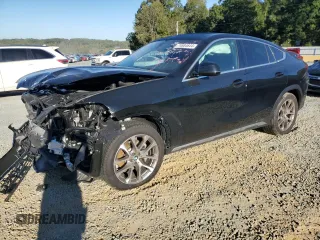 2021 BMW X6 sDrive40i z VIN 5UXCY4C06M9H63006, wystawiony jako Copart lot #74684644 z przebiegiem Nie podano mil oraz Szkody całkowita. Historia ofert i sprzedaży dostępna na DreamBid. Obrazek 1.