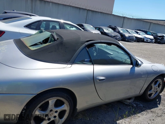 1999 Porsche 911 with VIN WP0CA2999XS652816, listed as a IAAI auction lot 41975822 with 291,258 mi miles and . Bid and sale history available at DreamBid. Image 13.