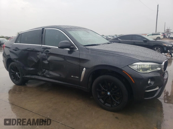 2015 BMW X6 sDrive35i with VIN 5UXKU0C59F0F91881, listed as a Copart auction lot 69878554 with 120,065 mi miles and Salvage Title. Bid and sale history available at carsss.com. Image 4.