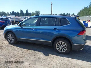 2018 Volkswagen Tiguan SEL z VIN 3VV2B7AX0JM084232, wystawiony jako IAAI lot #42726306 z przebiegiem 97 624 mil mil oraz . Historia ofert i sprzedaży dostępna na DreamBid. Obrazek 14.