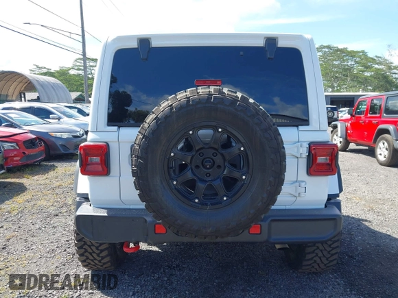 2022 Jeep Wrangler Unlimited Rubicon with VIN 1C4HJXFG8NW130156, listed as a IAAI auction lot 42004630 with 129,313 mi miles and . Bid and sale history available at DreamBid. Image 16.