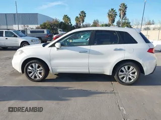 2012 Acura RDX Tech Pkg with VIN 5J8TB2H55CA000305, listed as a IAAI auction lot 41293627 with 209,566 mi miles. Bid and sale history available at carsss.com. Image 14.
