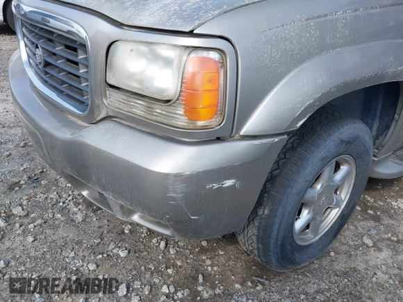2000 Cadillac Escalade z VIN 1GYEK63R2YR209125, wystawiony jako IAAI lot #41854270 z przebiegiem 198 017 mil mil oraz . Historia ofert i sprzedaży dostępna na DreamBid. Obrazek 6.