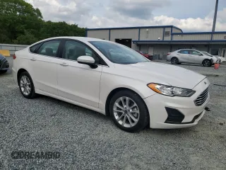 2020 Ford Fusion Hybrid SE with VIN 3FA6P0LUXLR184992, listed as a Copart auction lot 52674565 with 59,742 mi miles and Salvage Title. Bid and sale history available at carsss.com. Image 4.