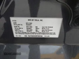2024 Tesla Model Y with VIN 7SAYGDED3RF002246, listed as a IAAI auction lot 41566184 with 10,316 mi miles and . Bid and sale history available at DreamBid. Image 9.