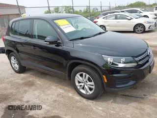 2013 Volkswagen Tiguan S with VIN WVGAV3AX2DW594334, listed as a IAAI auction lot 42405989 with 96,559 mi miles and . Bid and sale history available at DreamBid. Image 1.