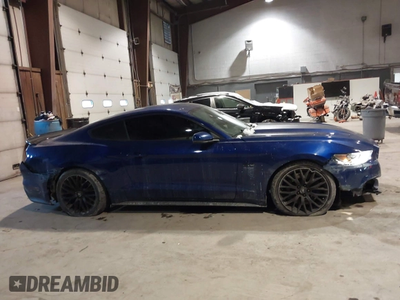 2015 Ford Mustang GT with VIN 1FA6P8CF1F5379452, listed as a IAAI auction lot 41355235 with 128,257 mi miles and . Bid and sale history available at DreamBid. Image 13.