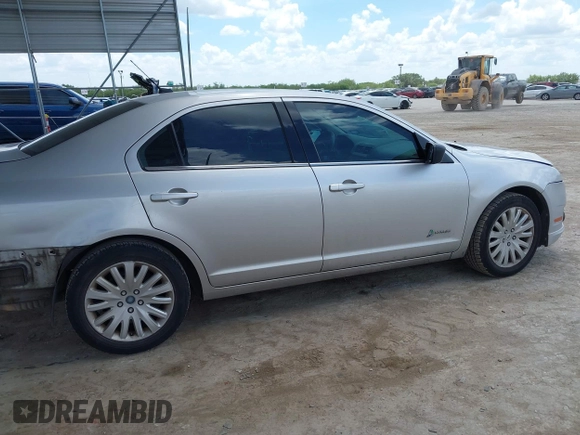 2012 Ford Fusion Hybrid с VIN 3FADP0L36CR426322, выставлен на аукционе IAAI как лот 42592635 с пробегом 151 941 миль миль и . История ставок и продаж доступна на DreamBid. Изображение 14.