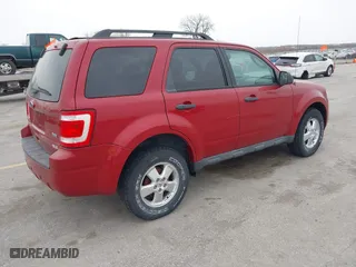 2011 Ford Escape XLT with VIN 1FMCU9DG1BKC37712, listed as a IAAI auction lot 41806476 with 108,866 mi miles. Bid and sale history available at carsss.com. Image 4.